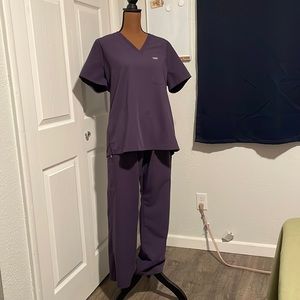 Lovingly used FIGS scrubs in Purple Shadow